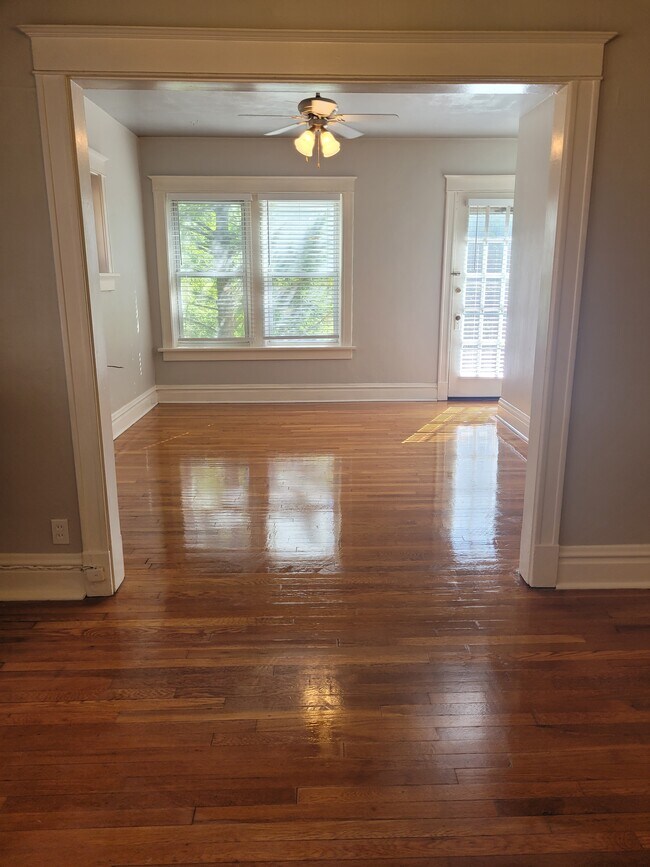 In the dining room looking back into the living room. - 2055 Alfred Ave