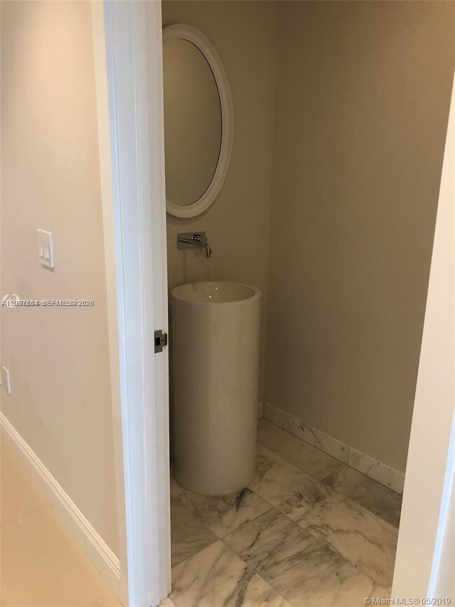 Building Photo - 10203 Collins Ave