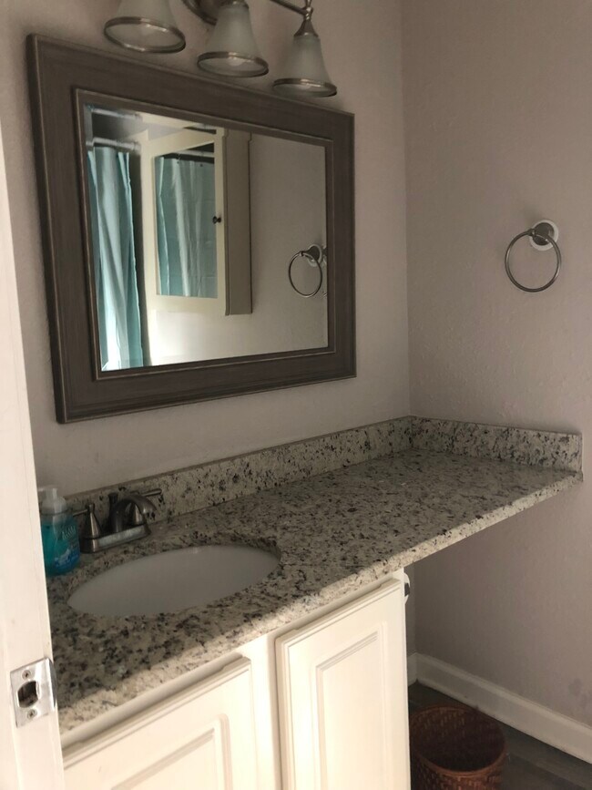 1550 E 2nd St Unit 103, Pass Christian, MS 39571 Condo for Rent in