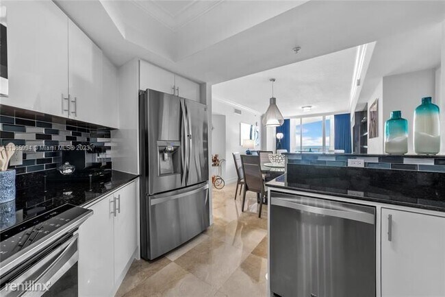 Building Photo - 3 br, 2.5 bath Condo - 16699 Collins Ave A...