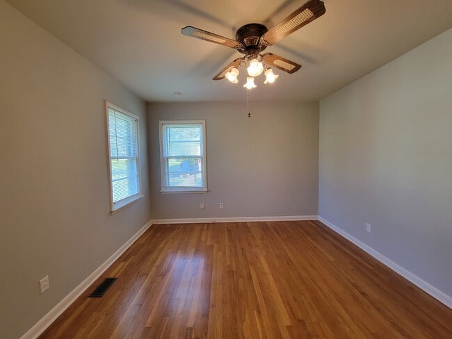 Building Photo - Fabulous 3-Bedroom Home with Gleaming Hard...