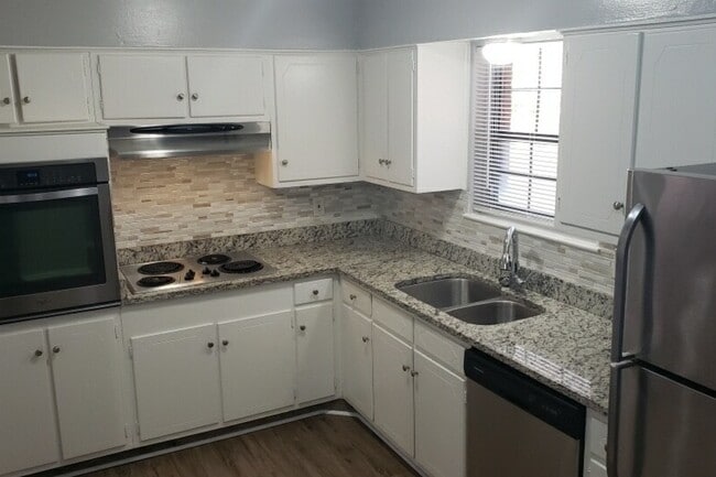 Granite countertops throughout - La Villa