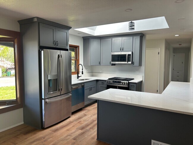 Building Photo - Completely Remodeled Home that Backs up to...