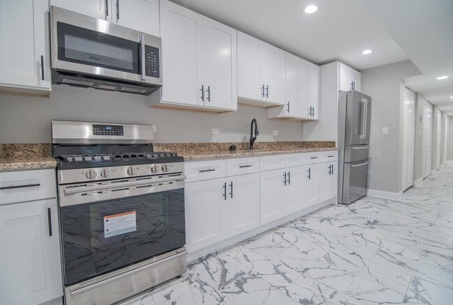Building Photo - 1509 N Kostner Ave