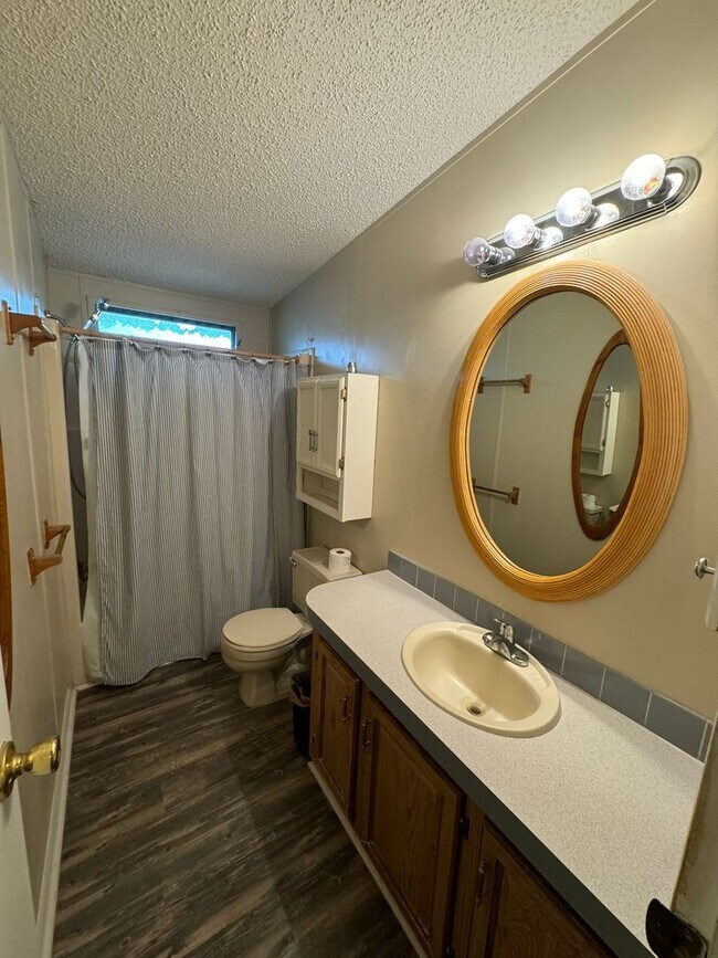 Building Photo - Charming (2BR/2BA) Home in 55+ Community –...
