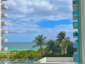 Building Photo - 9201 Collins Ave