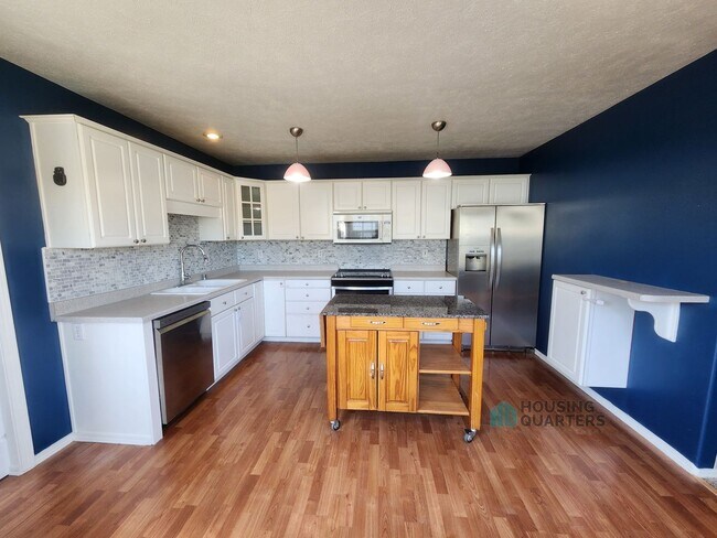 Foto del edificio - Spacious 4-Bedroom Home in Spokane Valley with Finished Basement & Fenced Yard