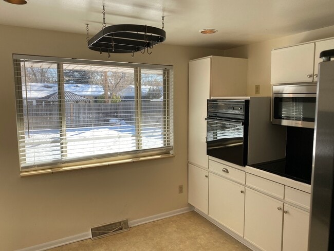 Building Photo - BRICK RANCH, FINISHED BASEMENT, CORNER LOT...