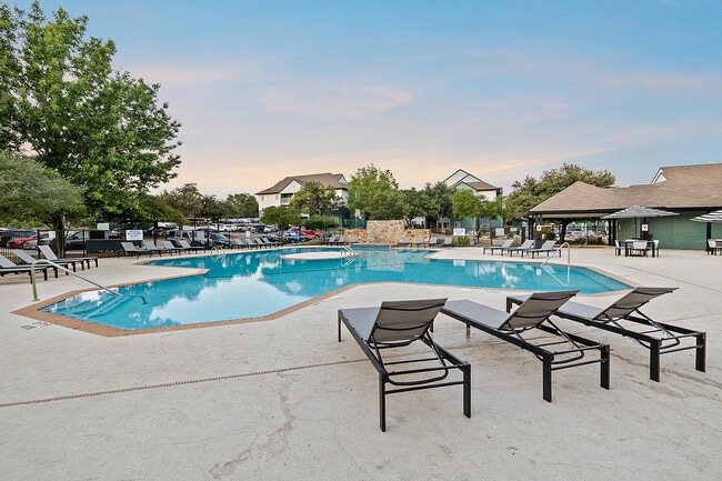 The-Outpost-San-Marcos-Apartments-Near-Texas-State-University-Resort-Style-Pool-Upgraded-Pool-Furniture - The Outpost