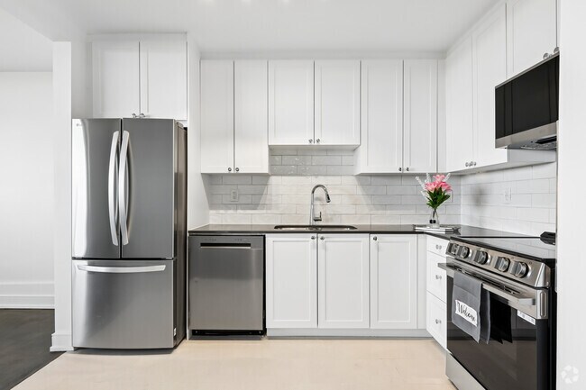 3 chambres, 1 salle de bain et demie - 116 m² - Cuisine - 25 Fisherville