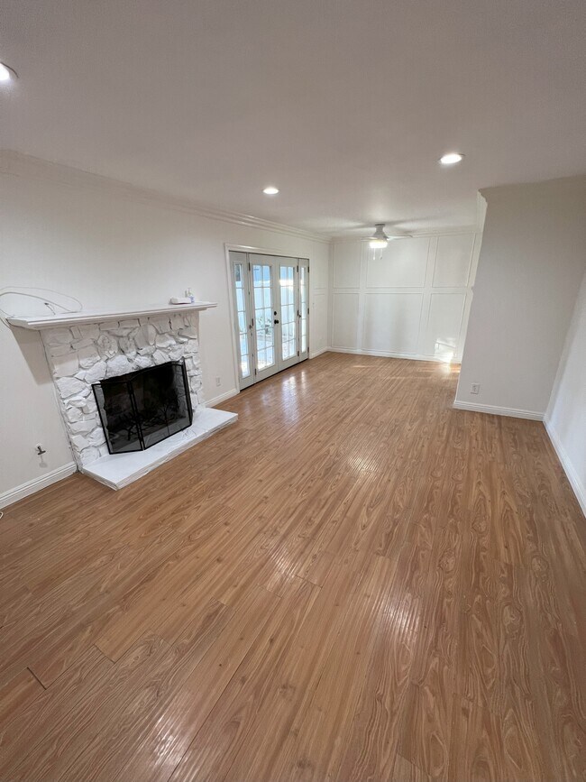 Fire Place Hardwood Floors - 7323 Shoup Ave