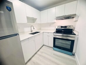Building Photo - 6095 W 18th Ave
