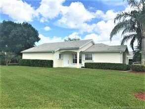 Building Photo - 3486 SW Pindo Palm Ln