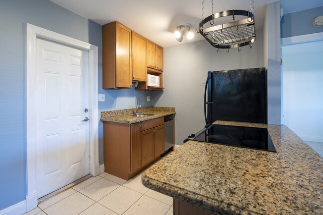 Kitchen and backyard door - 1023 NW 1st Ave