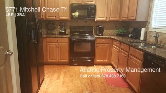 Building Photo - 5771 Mitchell Chase Trl