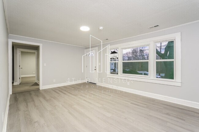 Foto del edificio - Charming 4 Bedroom Home with 2 Full Bathro...