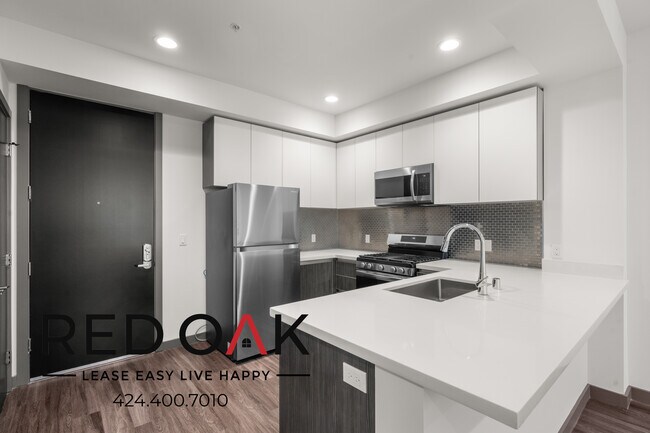 Building Photo - One Month Free! Spacious Two Bedroom with ...