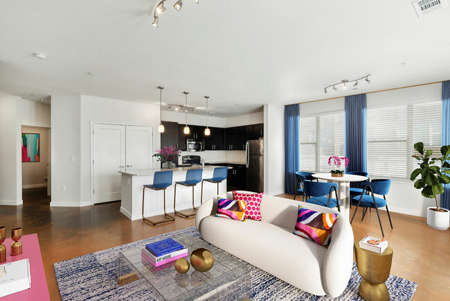 Step into this contemporary chic living space, designed for ultimate comfort and style. - Melrose Apartments