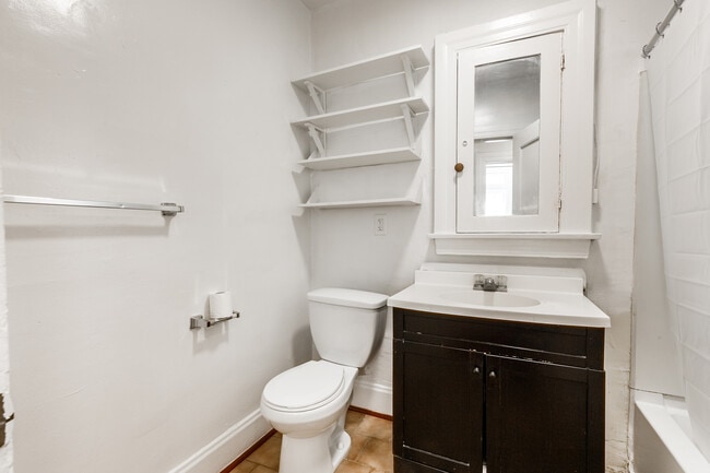 Photo - 1154 W 27th St Apartments