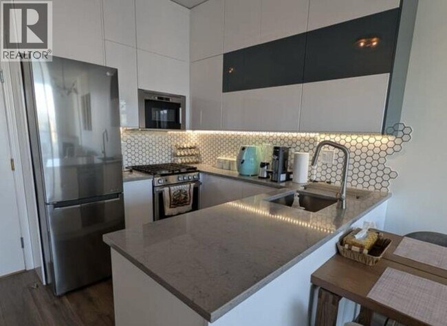 Photo du bâtiment - 1239 W Georgia St