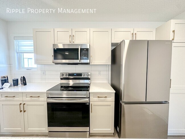 Photo du bâtiment - 50% OFF YOUR FIRST MONTHS RENT! AMAZING BR...