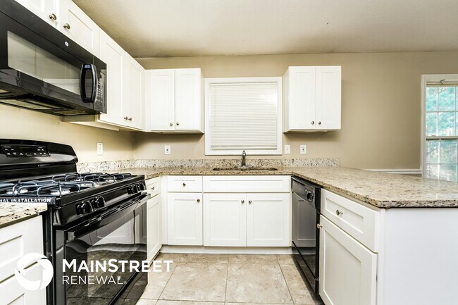 Foto del edificio - 8139 Green Garden Dr