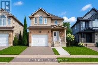 Building Photo - 240 Purple Sage Crescent