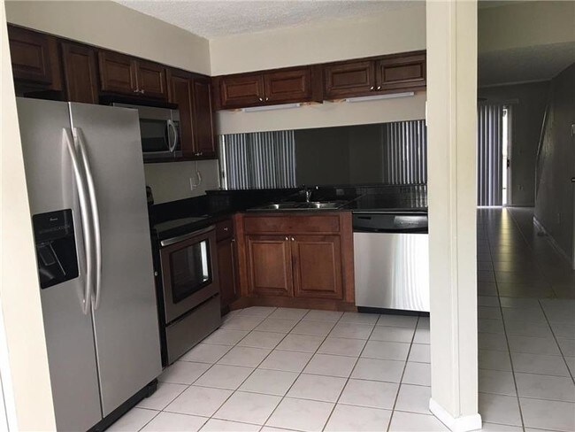 Foto del edificio - 6198 Riverwalk Ln