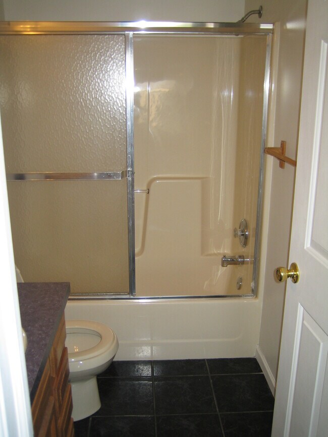 One of two upstairs full bathrooms (shower/bath) - 1409 Loop Road