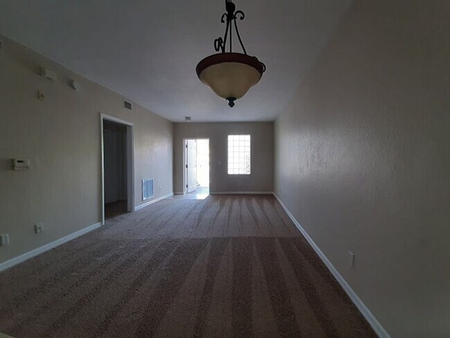 Building Photo - 2/2  Ground floor  with newer carpeting