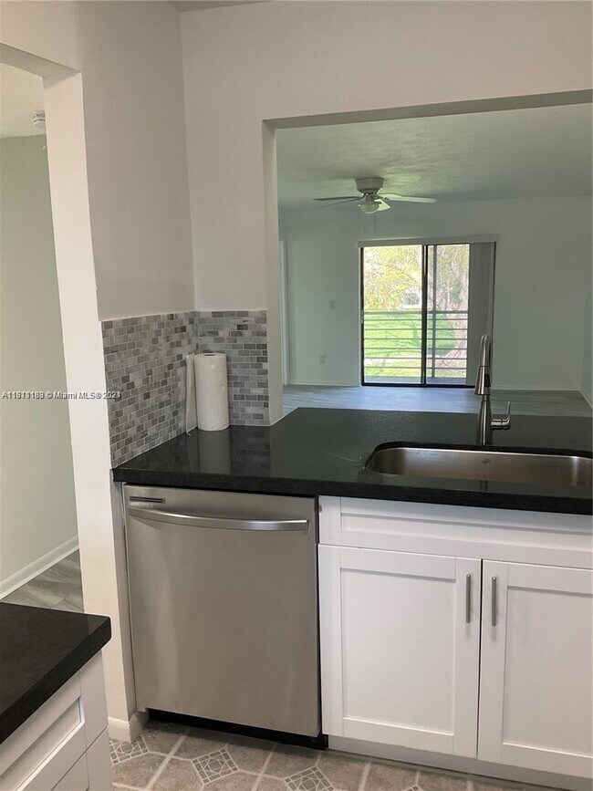 Building Photo - 14847 Southwest 104th Street Apt #10-201, ...