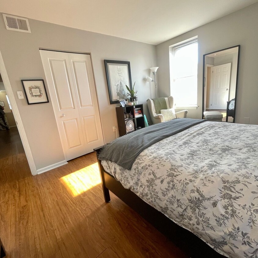 Primary Photo - SPACIOUS bi-level apartment with fenced yard