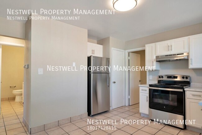 Building Photo - FREE 1ST MONTH'S RENT - Remodeled 2-bed Un...