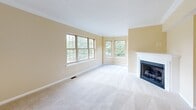 Located at 260 Jameson Way in Mars, PA, this three-bedroom, three-bathroom townhome is thoughtfully laid out across three floors, offering a functional and comfortable living experience. The ground floor features a spacious attached garage with a concrete floor, automatic opener, and an adjacent utility room housing the water heater and electrical panel. The main living level serves as the heart of the home, comprising a welcoming entrance, a hallway, a living room accented with crown molding and a distinctive oval window that brings in natural light, and a kitchen equipped with warm oak cabinetry, stainless steel appliances including a range and refrigerator, a dishwasher, and hardwood-style flooring. A bathroom is also found on this level. The upper floor houses all three bedrooms, including a generously sized primary bedroom with a double-door closet and soft carpeting. The additional bedrooms are well-proportioned, carpeted, and receive natural light through standard windows. The bathrooms feature hardwood-style flooring, oak vanities, and tub-shower combinations. The exterior reflects a classic townhome community aesthetic with manicured landscaping, paved driveways, and a tidy streetscape typical of the Mars, PA area.