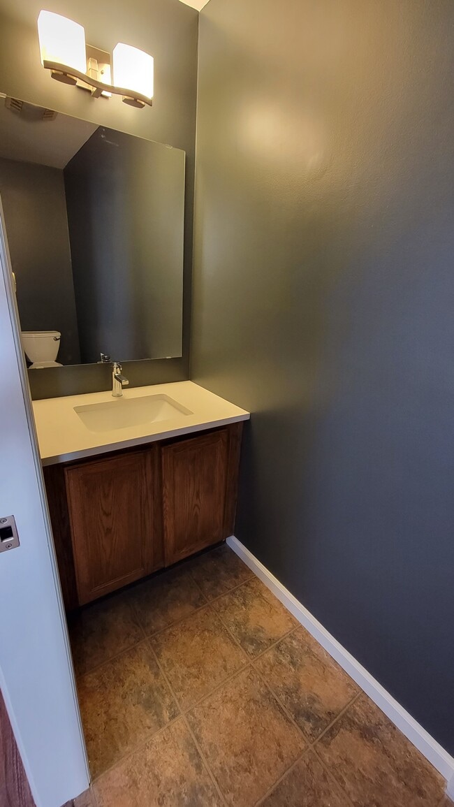 Half-Bath with new quartz counter and faucet - 46 Summitt Ave