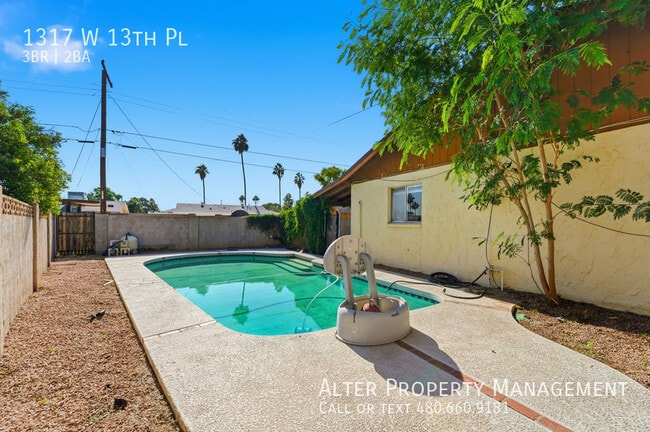 Building Photo - 1317 W 13th Pl