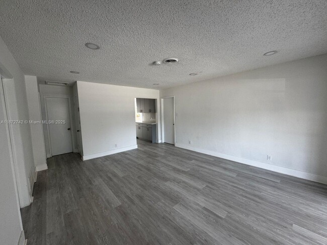Building Photo - 5373 NE 3rd Ter.
