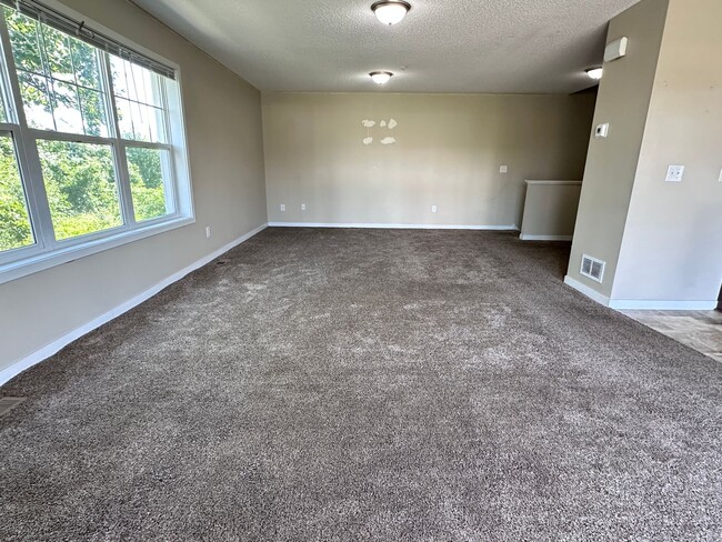 Building Photo - Champlin Corner Unit Town Home, 2 Car Garage, Dishwasher, Washer/Dryer, Balcony