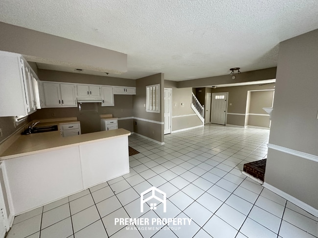 Building Photo - Charming 2BR/2.5BA Townhome | Dual Primary Suites, Fireplace & Fenced Yard