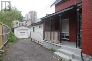 Photo du bâtiment - 1-511 COOPER St