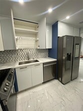 Building Photo - 5005 Collins Ave