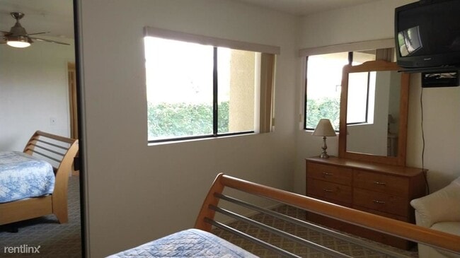 Building Photo - 3 br, 2 bath Condo - 2950 E Escoba Dr Apt L
