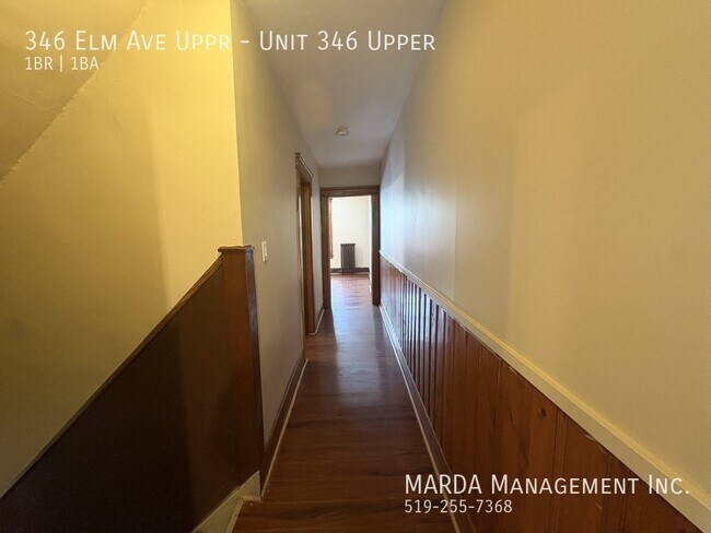 Photo du bâtiment - COZY 1 BED/1 BATH UPPER UNIT WEST INCLUSIVE W/ $50 CAP 1/2 MON FREE