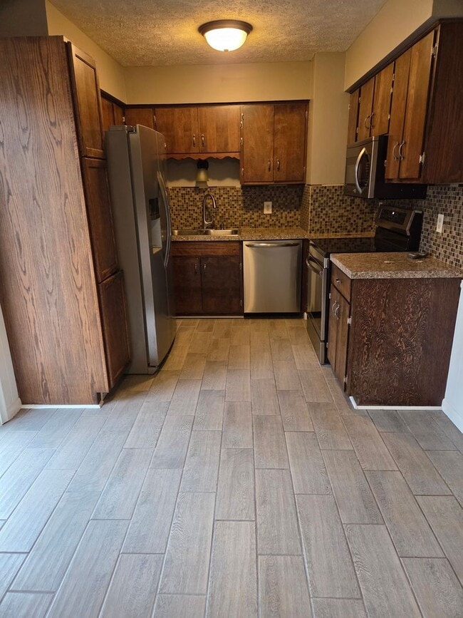 Photo - 3 bed 1.5 bath, 2 car garage, fenced in backyard, newly remodeled House