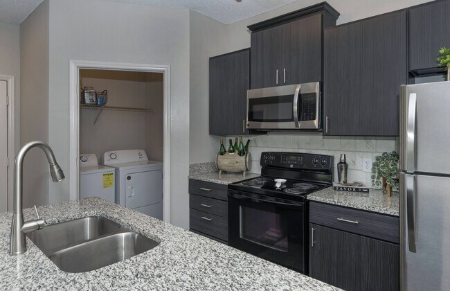 Building Photo - Seasons at Umstead Apartment Homes