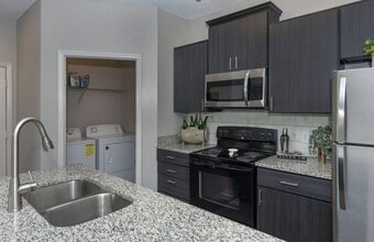 Building Photo - Seasons at Umstead Apartment Homes