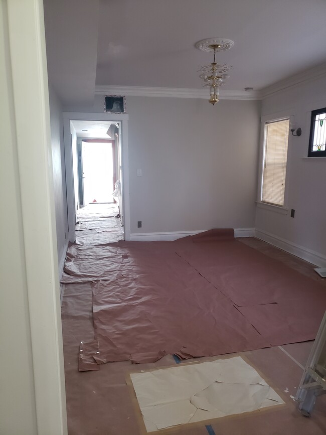 Dining room area freshly painted - 3811 N Central Park Ave