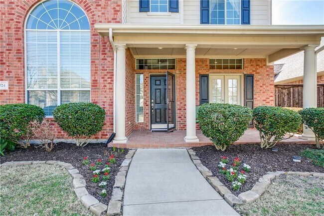 Foto del edificio - Immaculate home on a beautifully landscaped lot, tandem garage, plenty of storage!