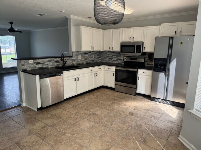 Foto del edificio - Stunning 3-Bedroom Home in Olive Branch - Spacious & Modern!