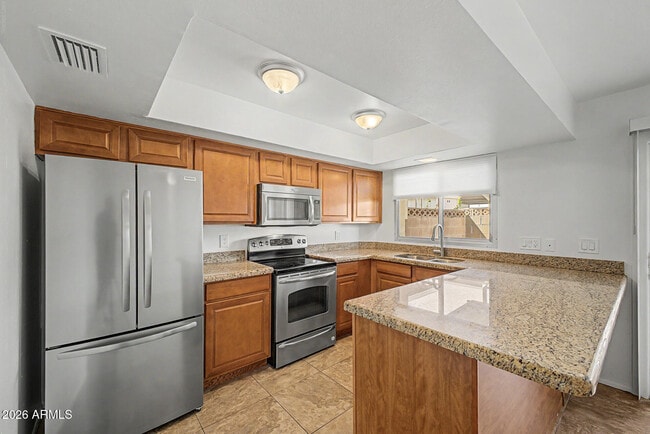 Building Photo - 8510 E Montebello Ave